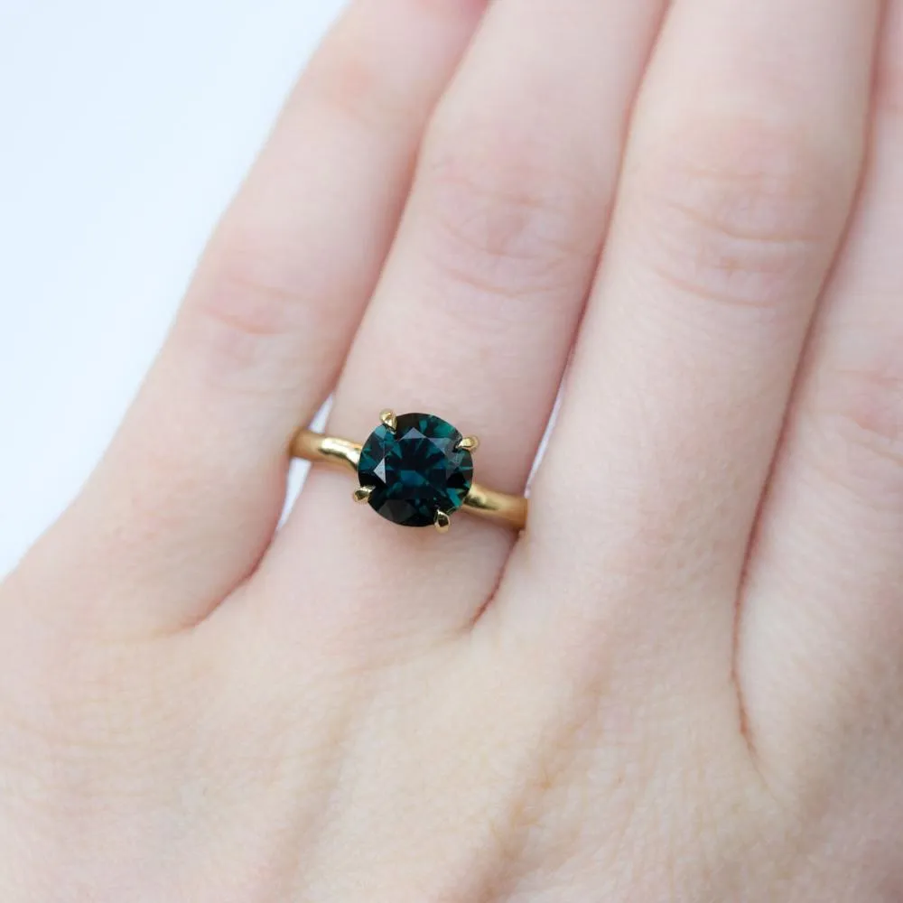 2.66 round deep teal blue green sapphire Alluvial solitaire ring in 18k yellow gold