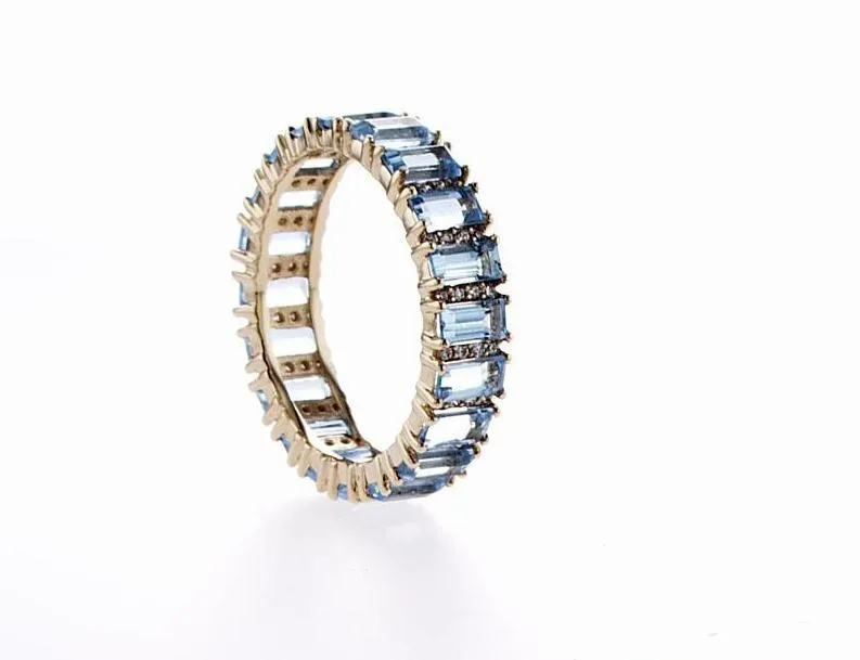 Blue Topaz Emerald Cut Eternity Ring