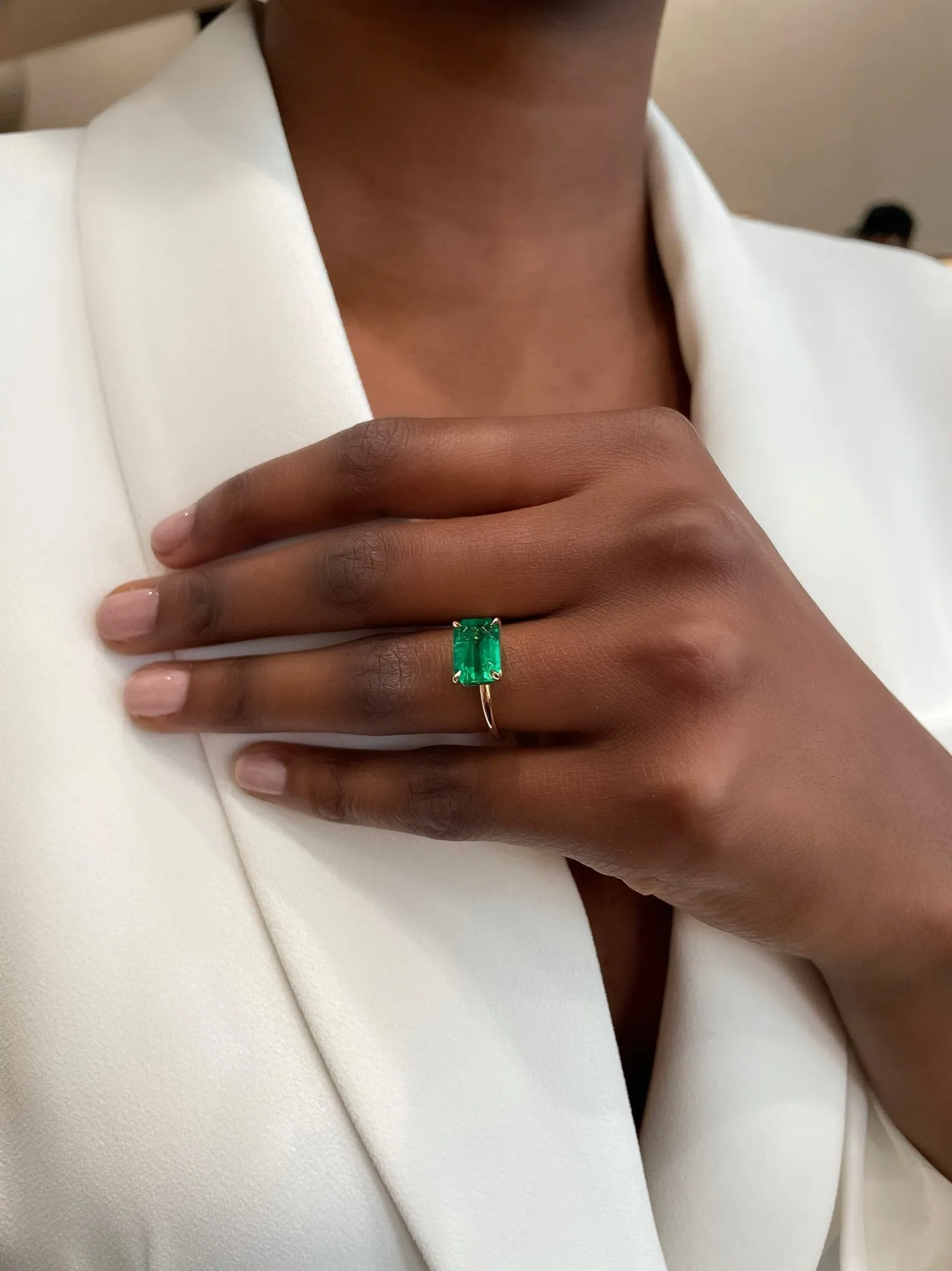 East-West Emerald Cut Emerald Ring