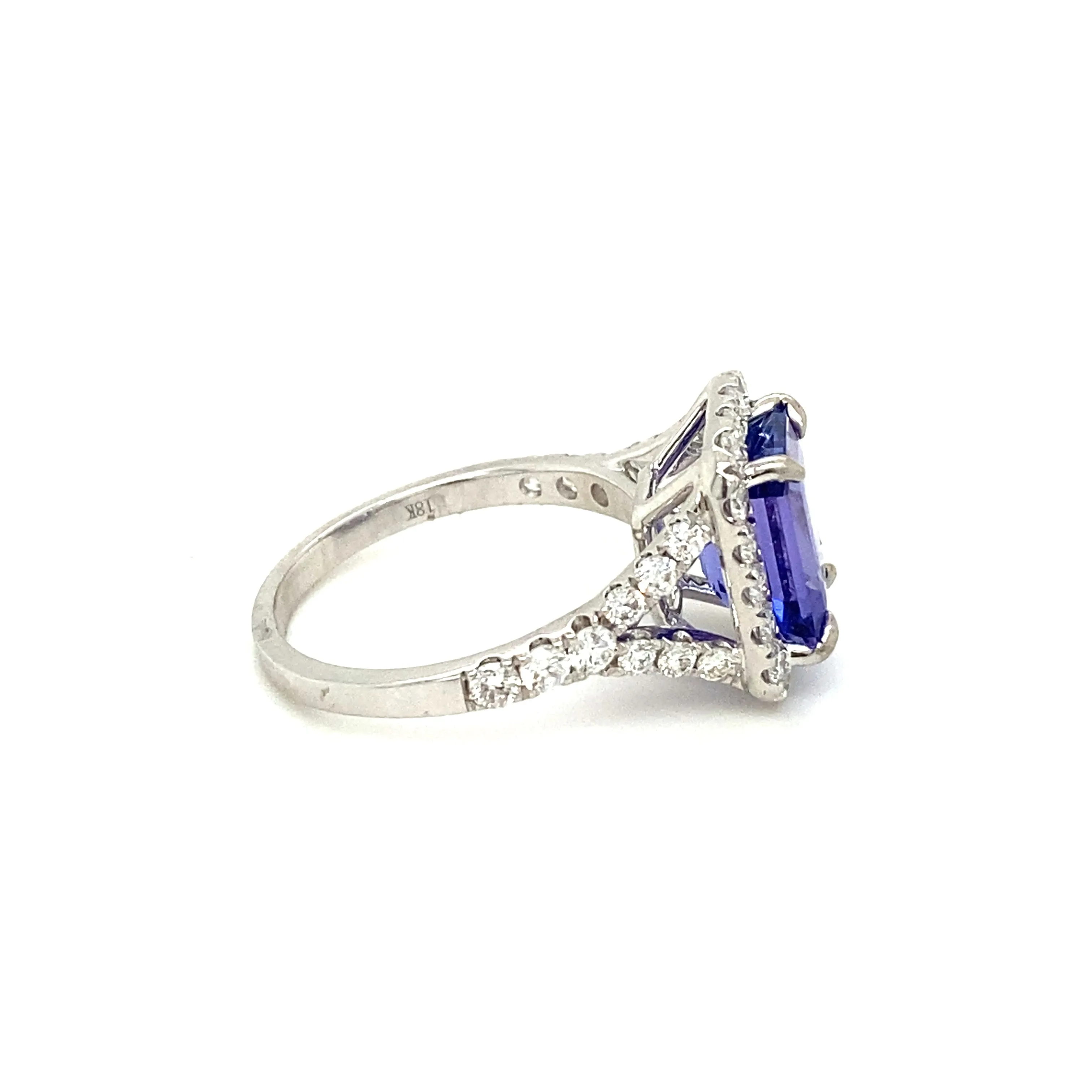 Emerald Cut Tanzanite & Diamond Halo Ring