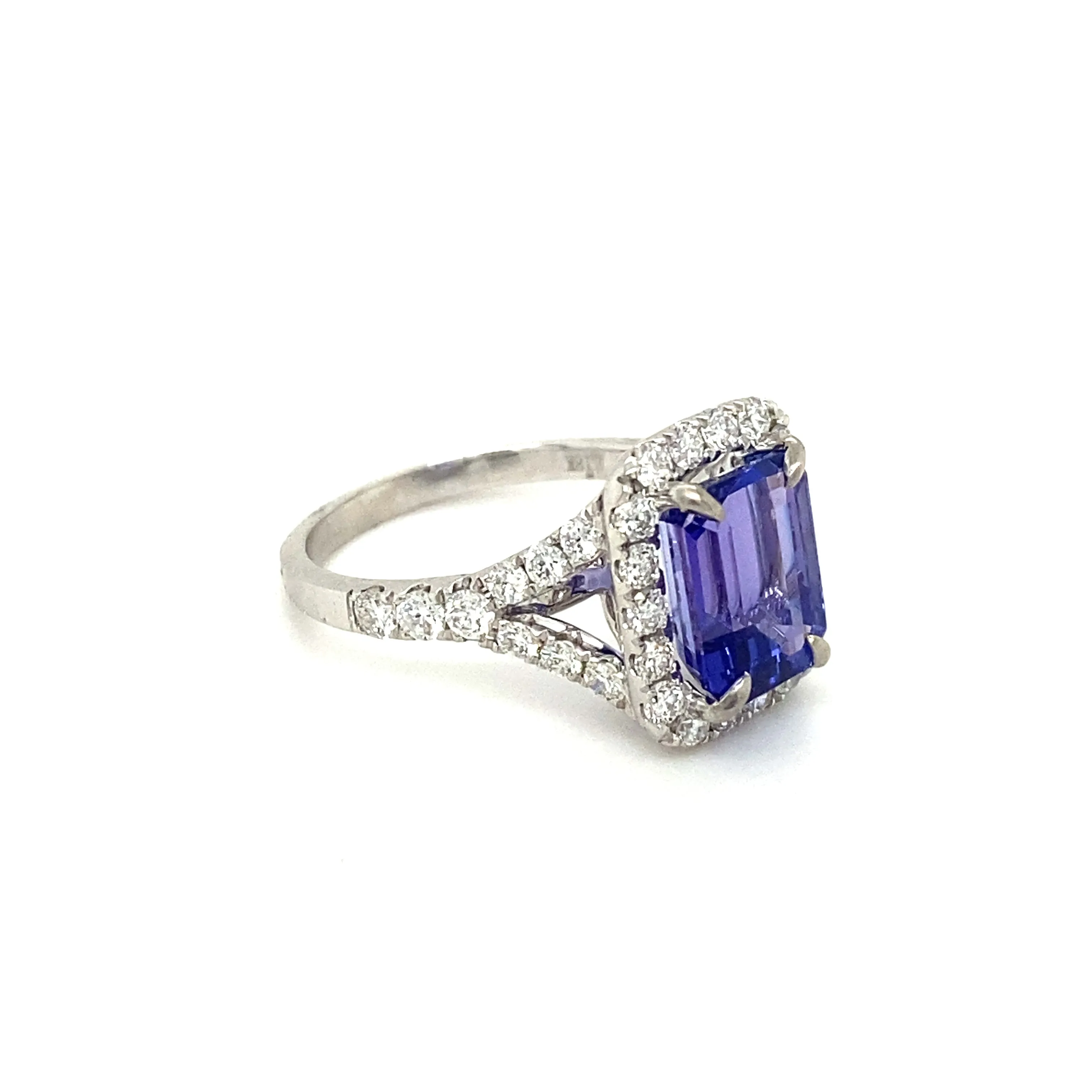 Emerald Cut Tanzanite & Diamond Halo Ring