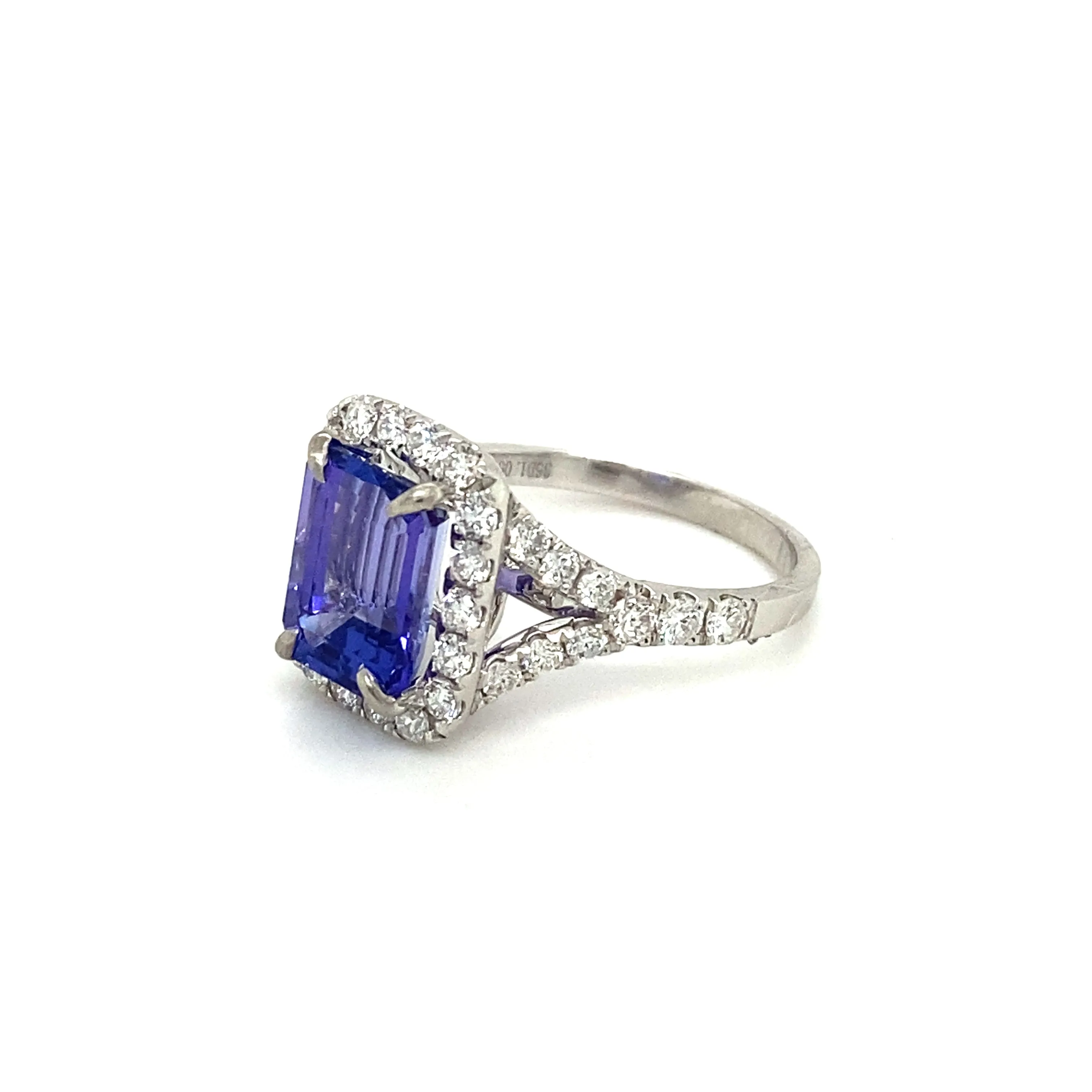 Emerald Cut Tanzanite & Diamond Halo Ring