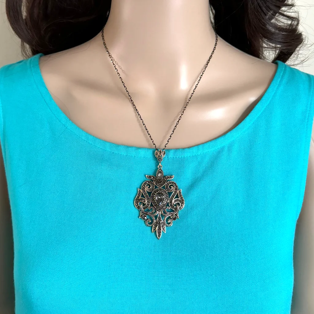 Gold and Black Ornate Pendant Necklace