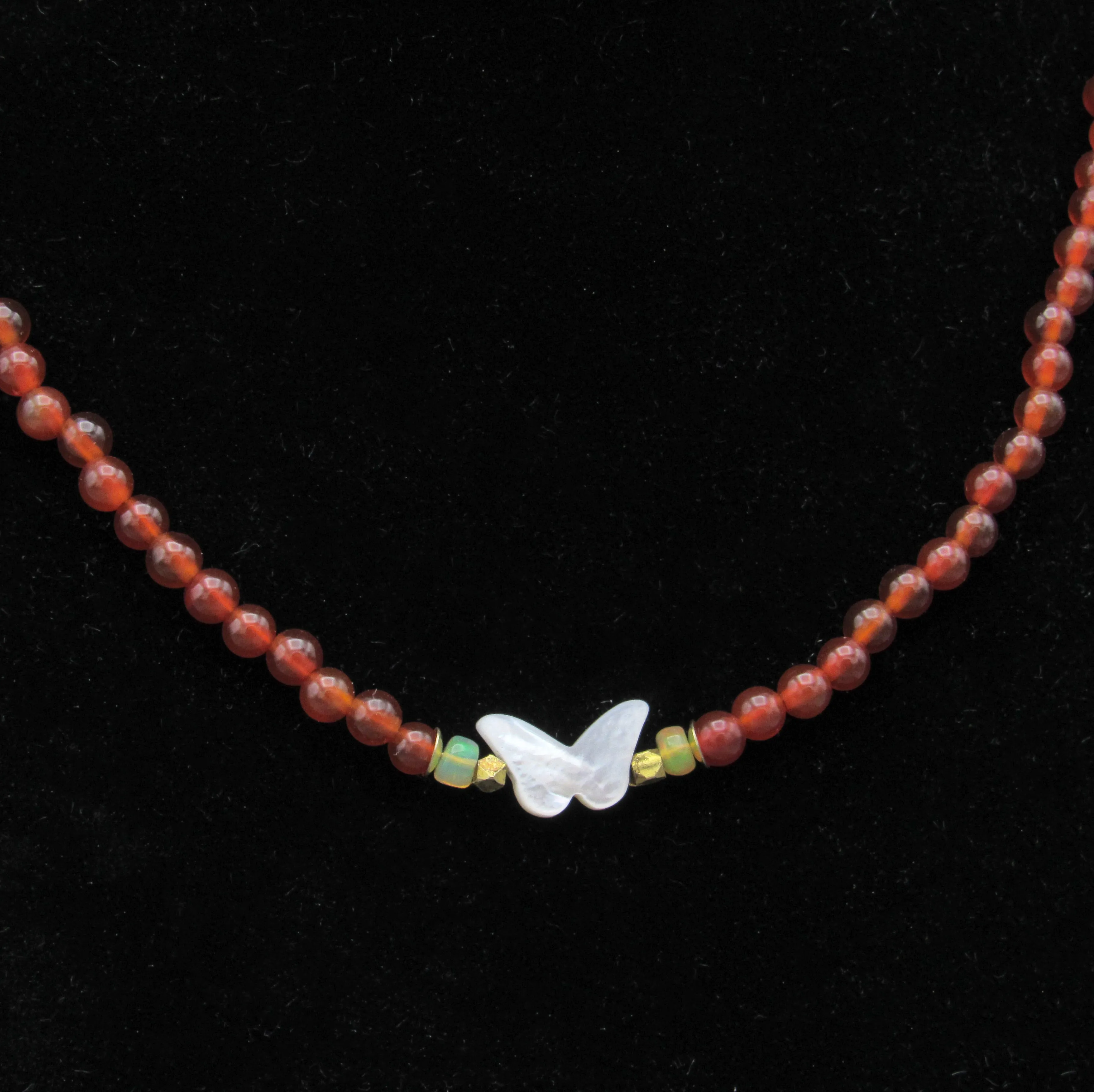 Mother of Pearl Butterfly, Red Onyx gemstone, and Ethiopian Fire opals w/ 14 kt gf Components